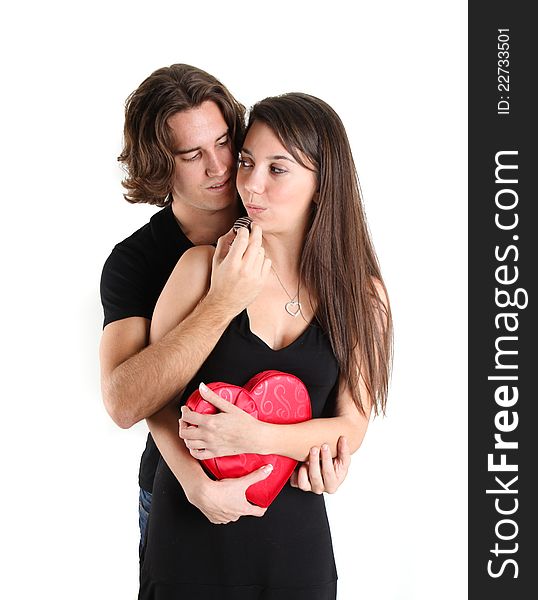 Pretty Brunette With her handsome guy being fed Chocolates. Pretty Brunette With her handsome guy being fed Chocolates