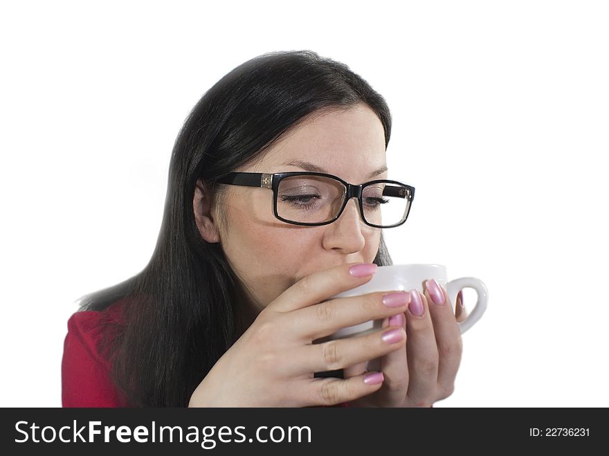 Brunette girl with glasses trying to flavored coffee. Brunette girl with glasses trying to flavored coffee