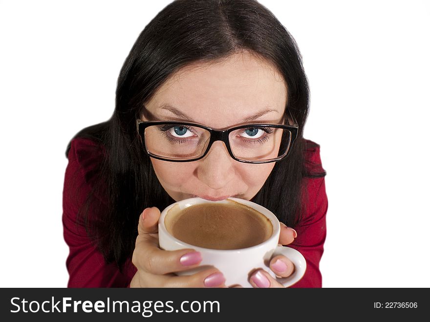 Brunette girl with glasses trying to flavored coffee. Brunette girl with glasses trying to flavored coffee