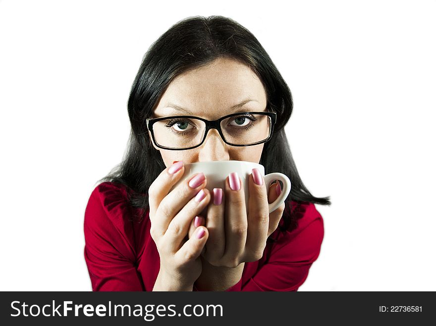 Brunette girl with glasses trying to flavored coffee. Brunette girl with glasses trying to flavored coffee