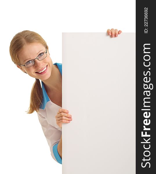 Beautiful young nurse holding a blank banner isolated on white background. Beautiful young nurse holding a blank banner isolated on white background