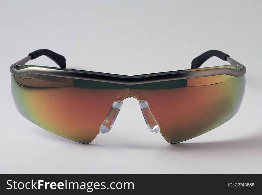 Image of a pair of sun glasses taken in a product studio