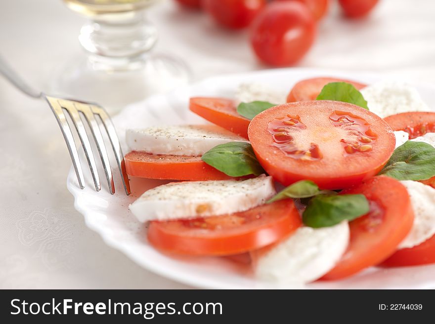 Salad with mozzarella and tomatoes