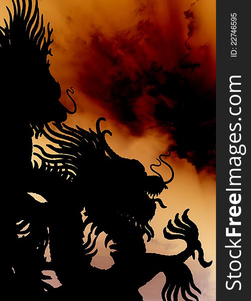 Large statues of Dragon black silhouette in sky prominently. Large statues of Dragon black silhouette in sky prominently.