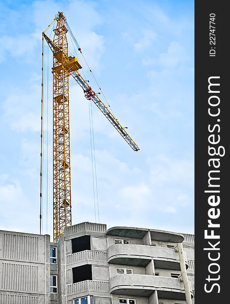 Construction-site with raw building and crane