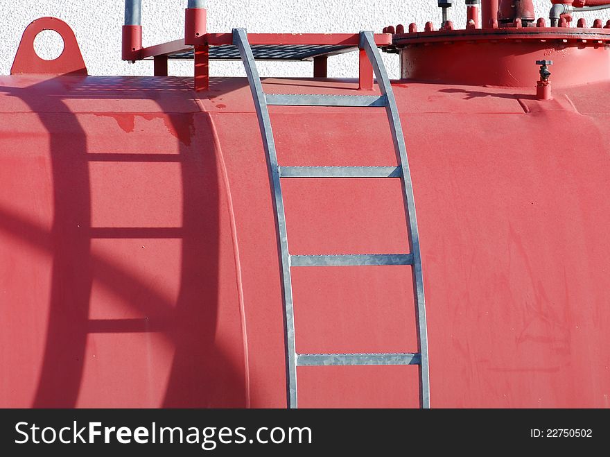 Close up of large red gas tank