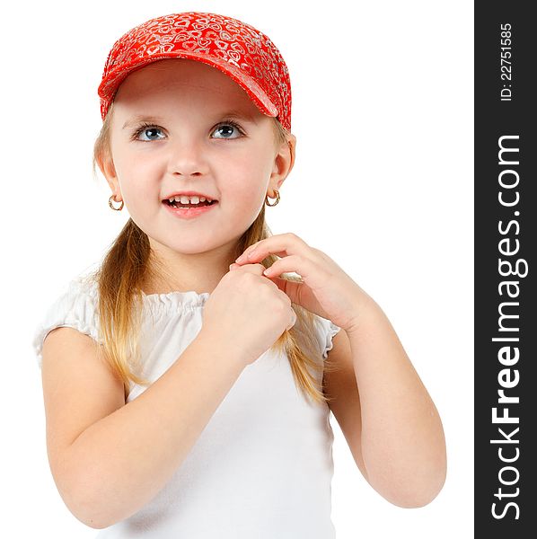 Little girl looking up and holding her hair