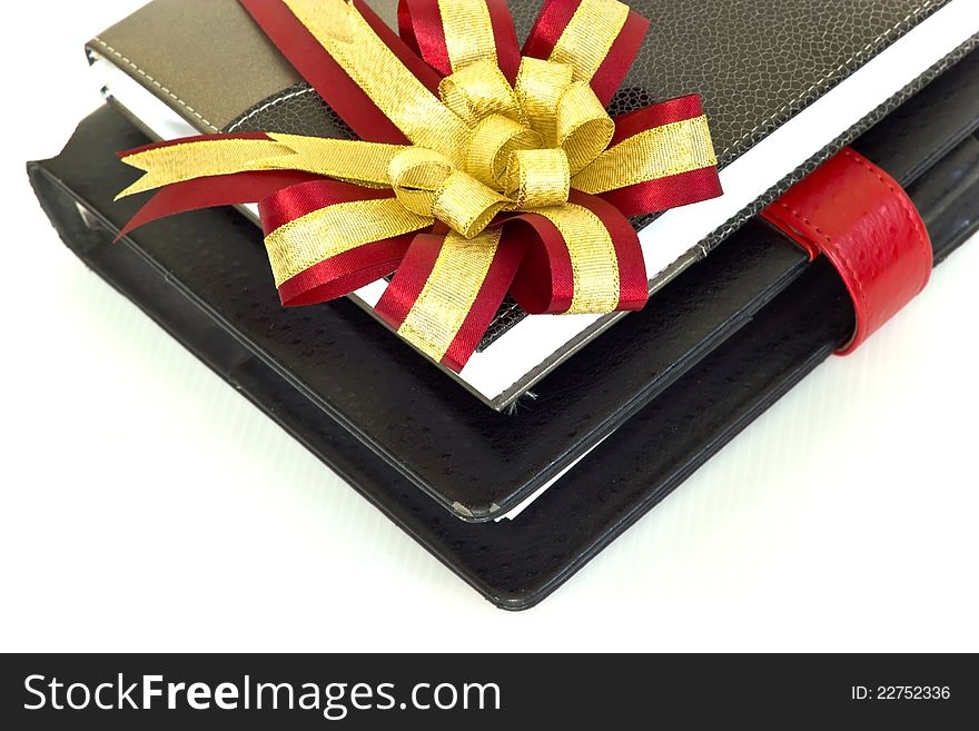 Notebook With Crimson And Gold Ribbon.