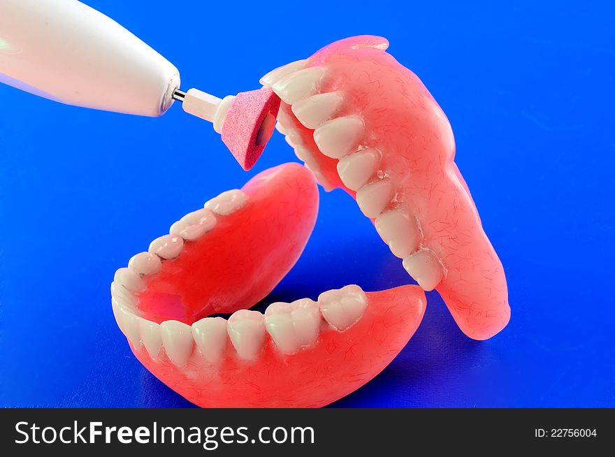 Artificial teeth and different types of tools for fine-tuning of prostheses. Artificial teeth and different types of tools for fine-tuning of prostheses