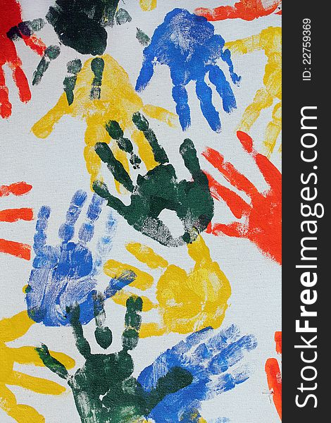 Colorful hand imprints in various shapes and patterns