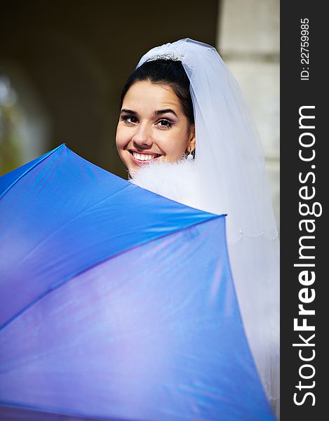 Beautiful Bride With Blue Umbrella