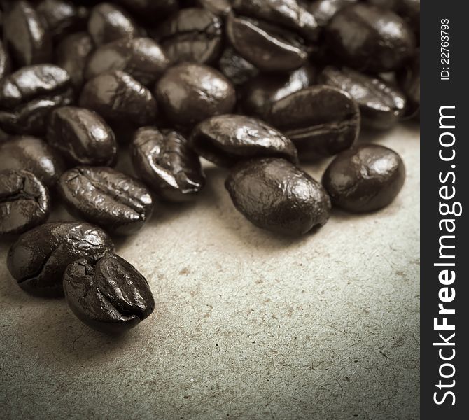 Closeup coffee beans on cardboard