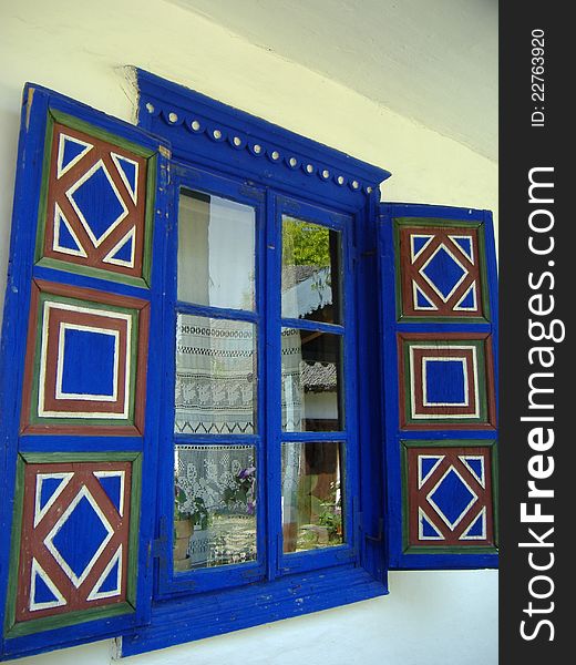 Blue window with geometrical theme