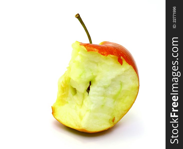 Apple core on a white background closeup