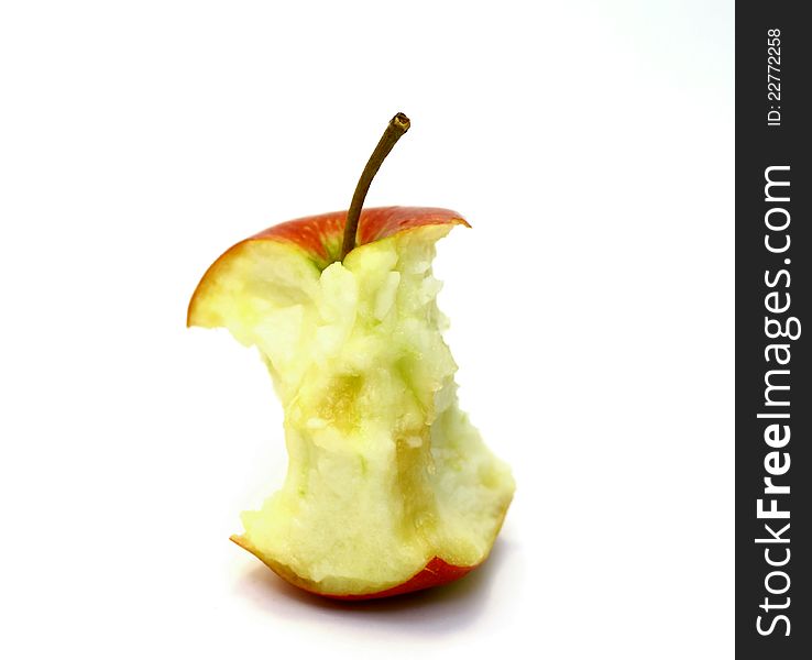 Apple core on a white background closeup