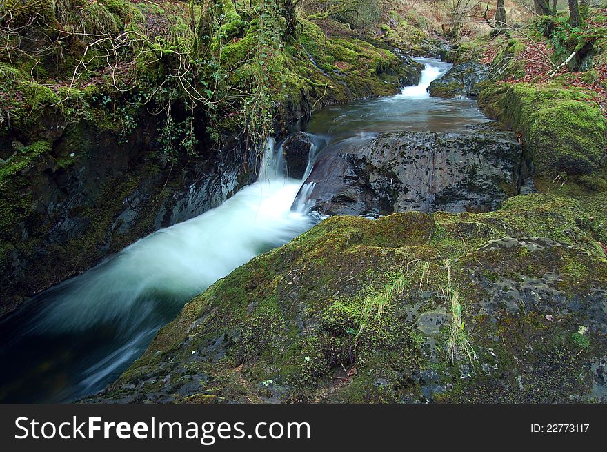 A stream with cascades near Okehampton, on dartmoor, devon, england. A stream with cascades near Okehampton, on dartmoor, devon, england