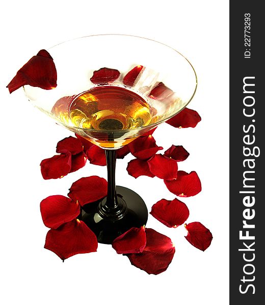 Glass and rose petals