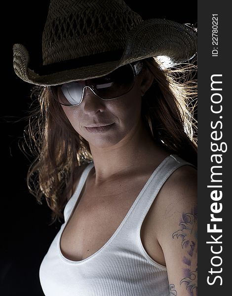 Rockstar Woman In Cowboy Hat And Tanktop