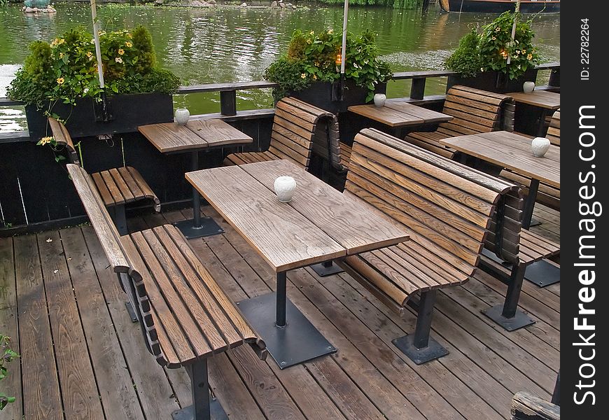 Outdoor restaurant cafe by a lake Tivoli Gardens Copenhagen Denmark