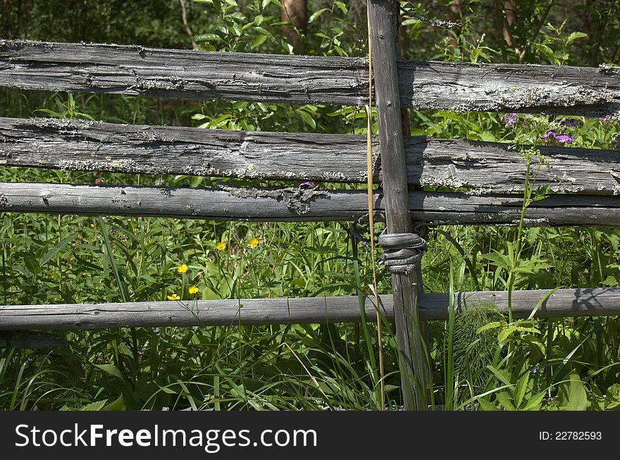 Old wooden fence in Finland.