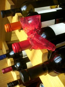 Wine Bottles With Red Ribbon Stacked On Wooden Rac Royalty Free Stock Photos Wine Bottles With Red Ribbon Stacked On Wooden Rac Royalty Free Stock Photos