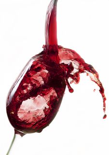 Red Wine Pouring Into Glass Stock Images