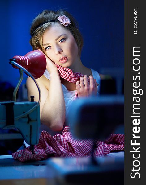 Seductive Blond Sewing In Her Workshop