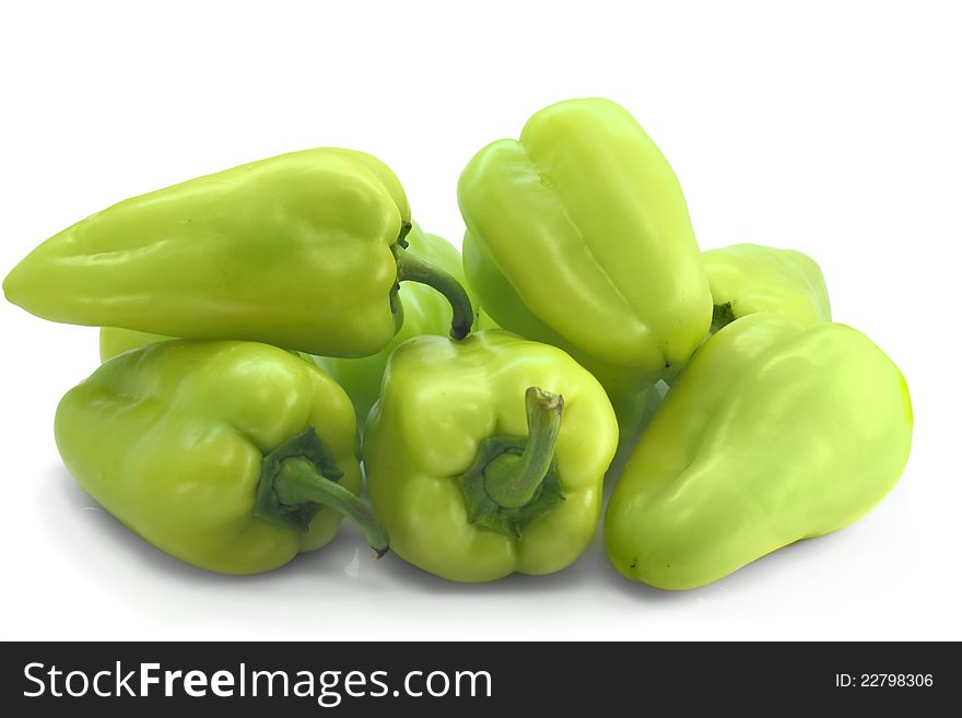Green peppers on white