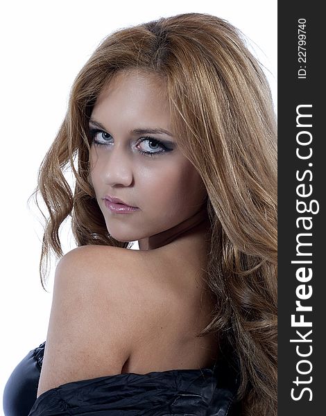 Woman looking over the shoulder, photographed on a white background