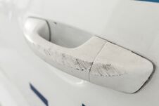 Close-up Of A White Damaged Car Handle. Copy Space. Stock Photography