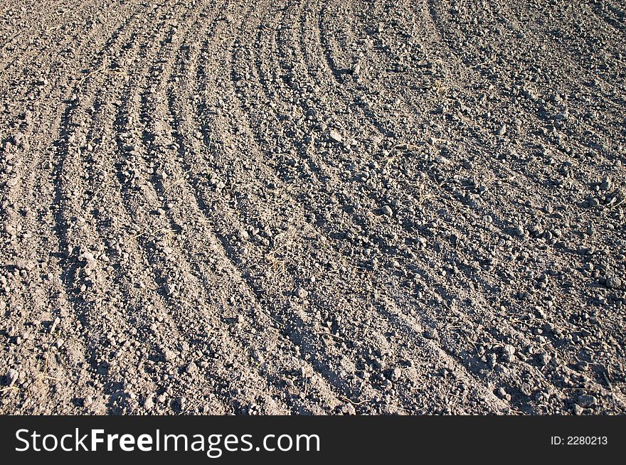 Texture of ploughed earth on the spring field. Texture of ploughed earth on the spring field