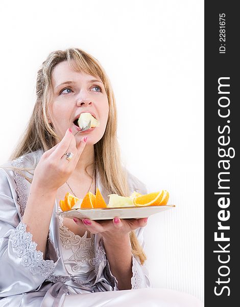 A woman eating melon
