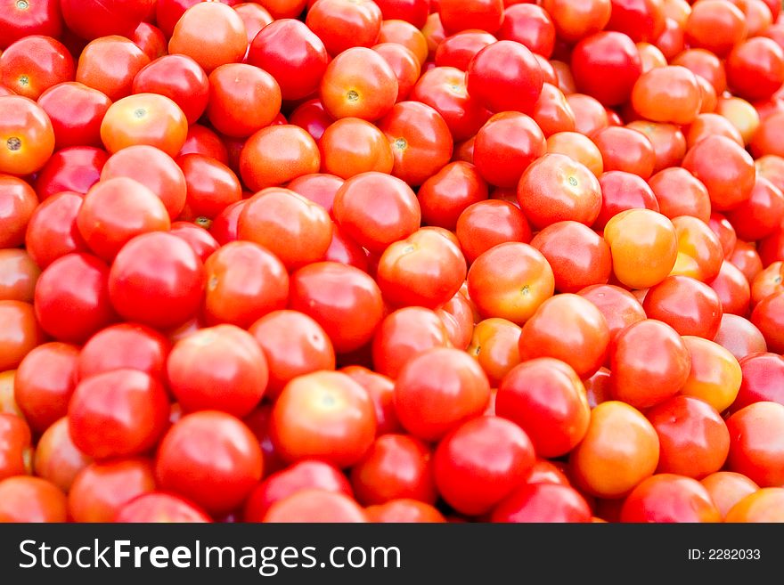 A Pile Of Juicy Red Tomatoes