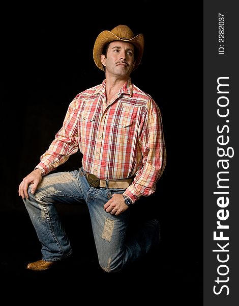 Adult cow boy posing for fashion shots. Adult cow boy posing for fashion shots