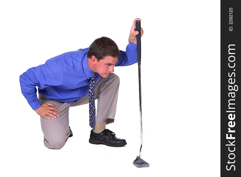 Man with blue shirt aiming over putter . Isolated white background. Man with blue shirt aiming over putter . Isolated white background