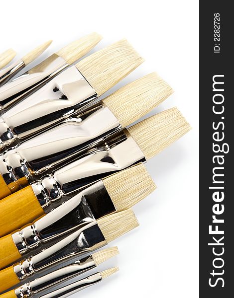 Set of clean paintbrushes on a white background