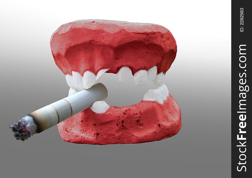 Jaw with a cigarette in teeth