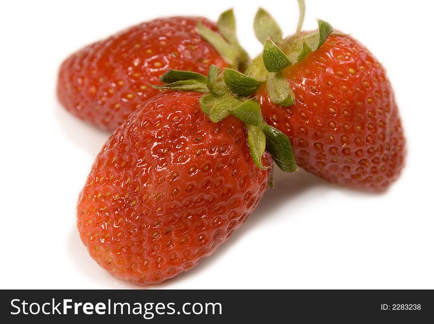 Some strawberries isolated on white background