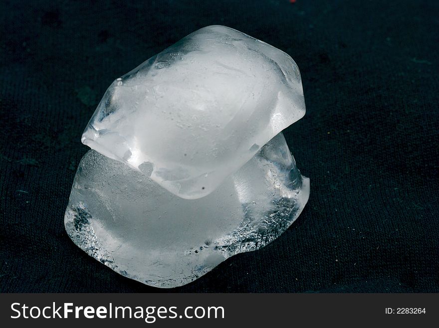 Ice cubes on a black background