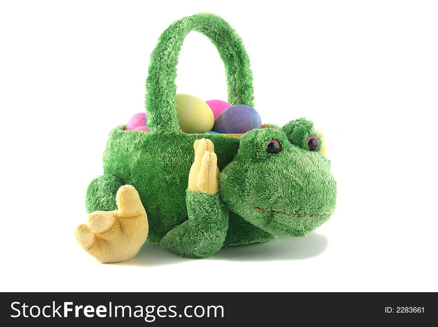 Easter egg basket in the shape of a frog with eggs in it. Easter egg basket in the shape of a frog with eggs in it