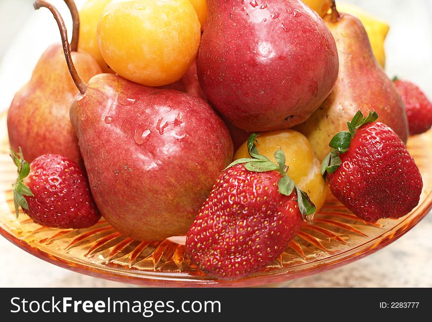 Fruits assortment isolated on the table. Fruits assortment isolated on the table