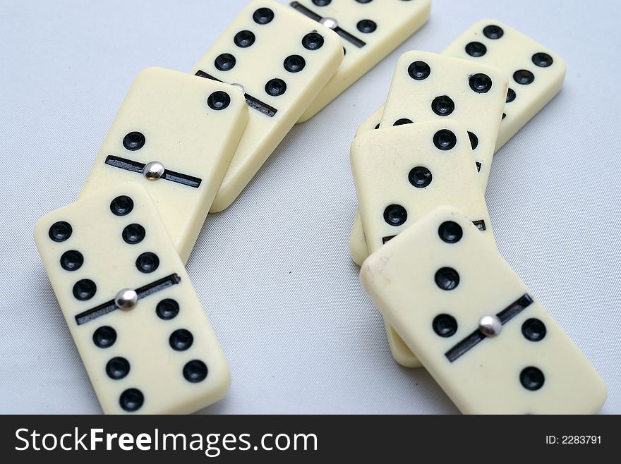 Set of Dominos set up on a white background. Set of Dominos set up on a white background