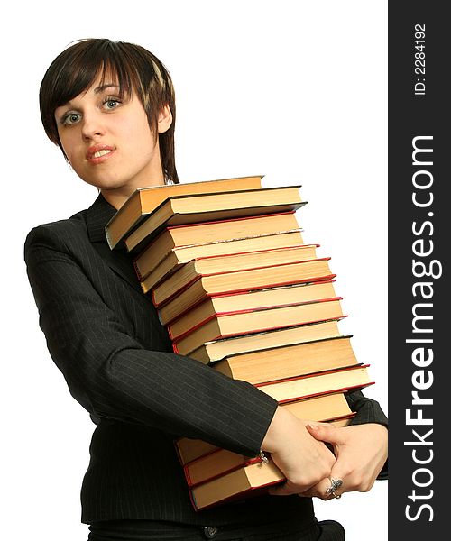 The young smiling girl with books, isolated on white. The young smiling girl with books, isolated on white