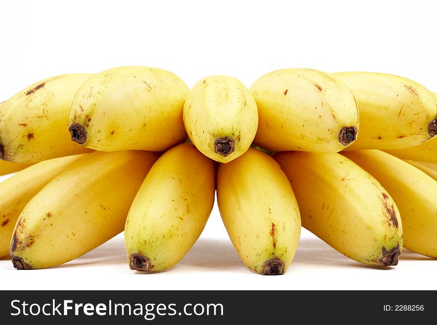 View of  bunch of nice fresh delicious bananas on white sheet