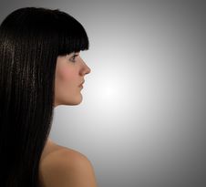 Beautiful Young Brunette In A Profile Royalty Free Stock Image