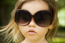 Little Girl Wears A Large Adult Sunglasses Royalty Free Stock Photo Little Girl Wears A Large Adult Sunglasses Royalty Free Stock Photo