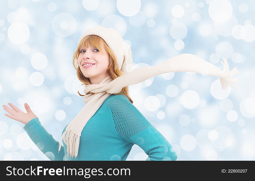 Christmas portrait of a beautiful  happy girl with scarf fluttering. Christmas portrait of a beautiful  happy girl with scarf fluttering