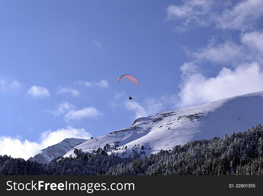 Man paragliding on mountain hill. Man paragliding on mountain hill