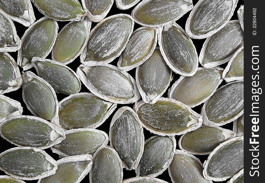 Closeup of pumpkin kernels in shells