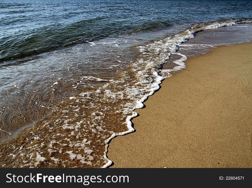 Beautiful blue ocean waves and golden sand. Beautiful blue ocean waves and golden sand